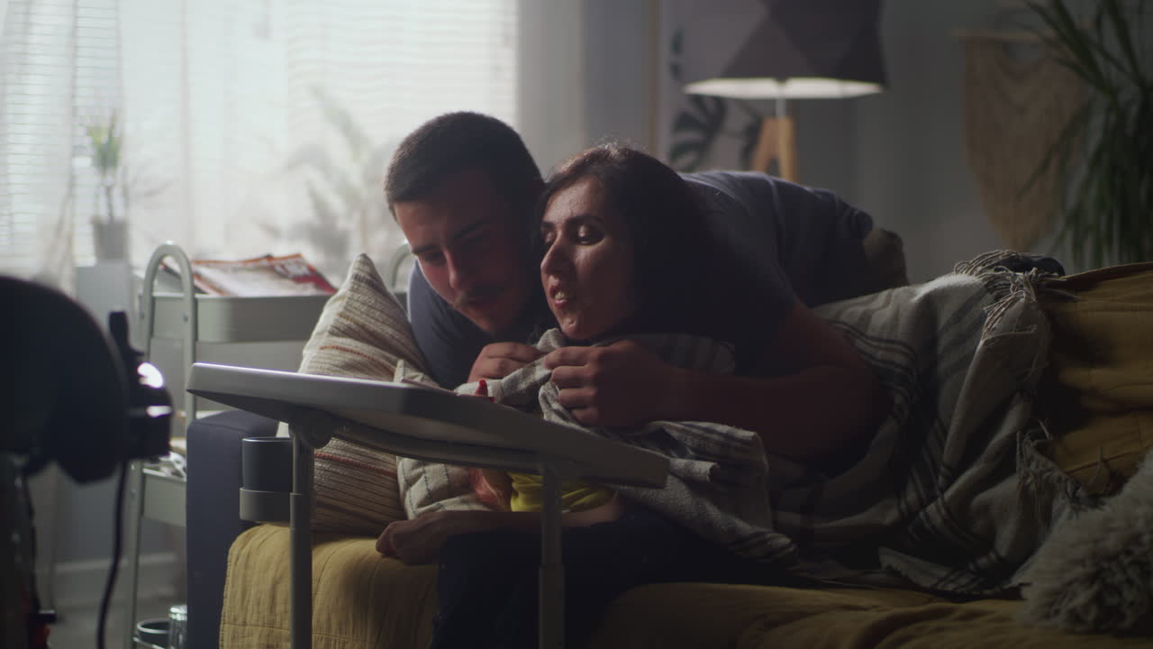 Caucasian Intern Woman Using Computer Laptop Talking with Business Man Indian Mentor Boss Pointing