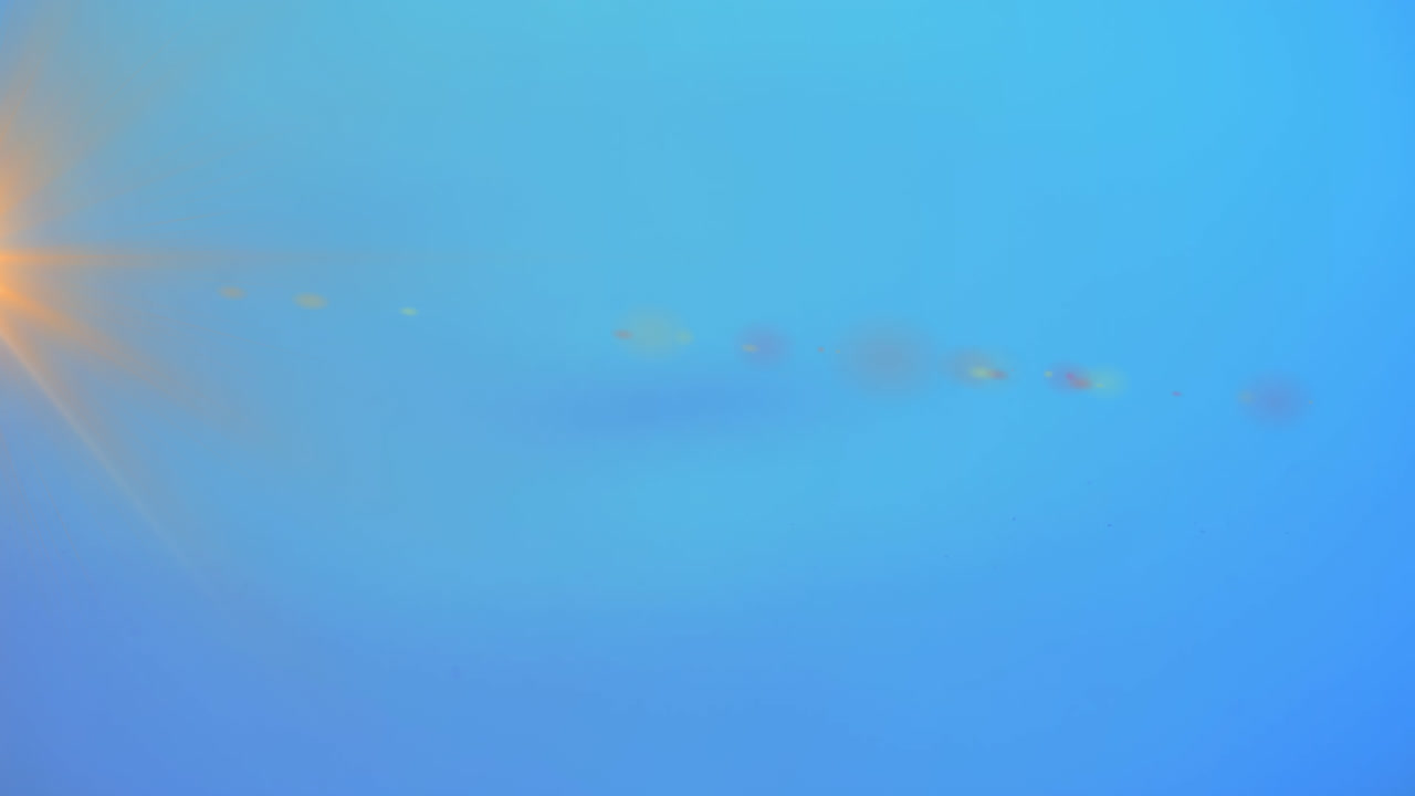 물방울 위에 있는 빛의 반점들의 애니메이션