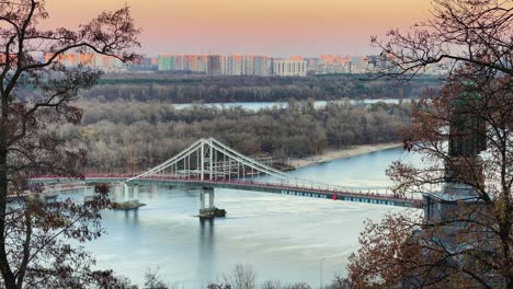 mist patona bridge over the dnieper river in kyiv ukraine