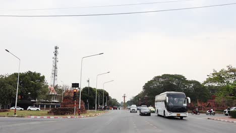 a bus travels along a busy city street