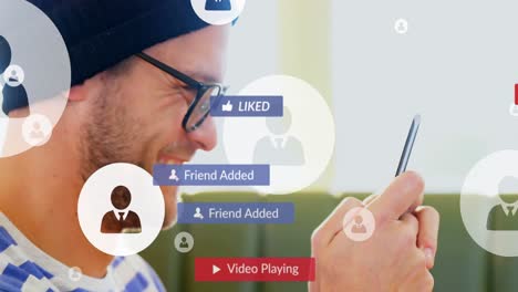 animation of social media text on banners with digital icons over man using smartphone