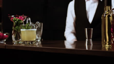 Bartender-serving-a-cocktail