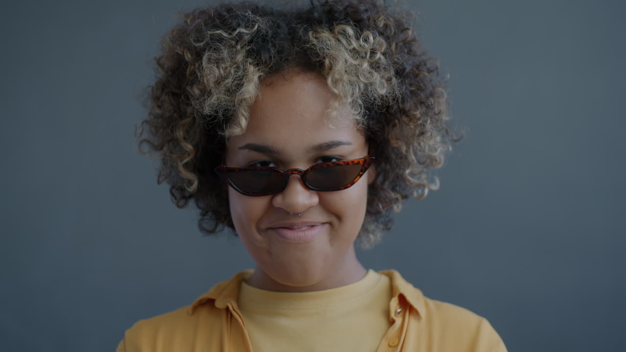 Young Woman Wearing Sunglasses