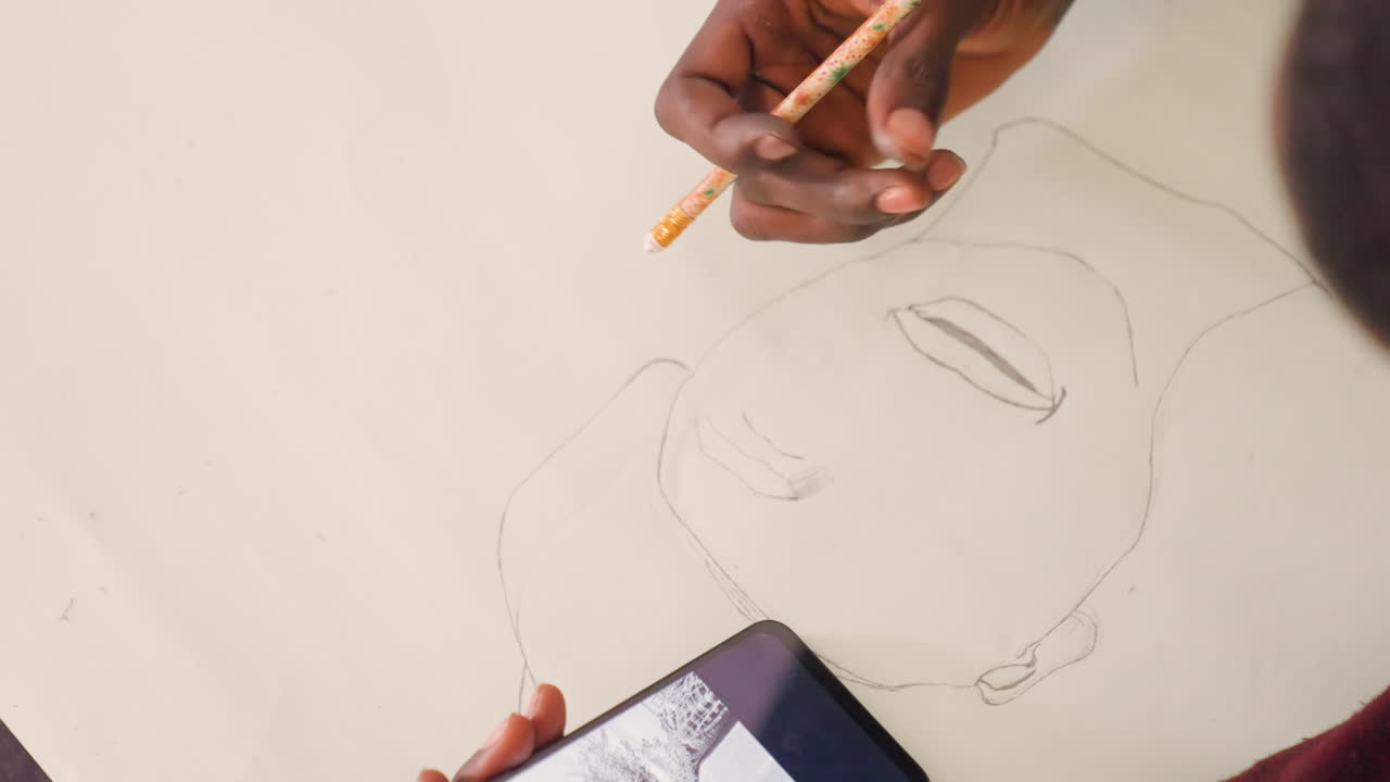 Closeup drawing facial features with phone reference showing black painting, pencil shading nose and eyes. Intense detail work on paper, precise graphite strokes, calm studio energy and concentrated