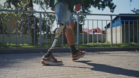 man with prosthetic leg walking outdoors