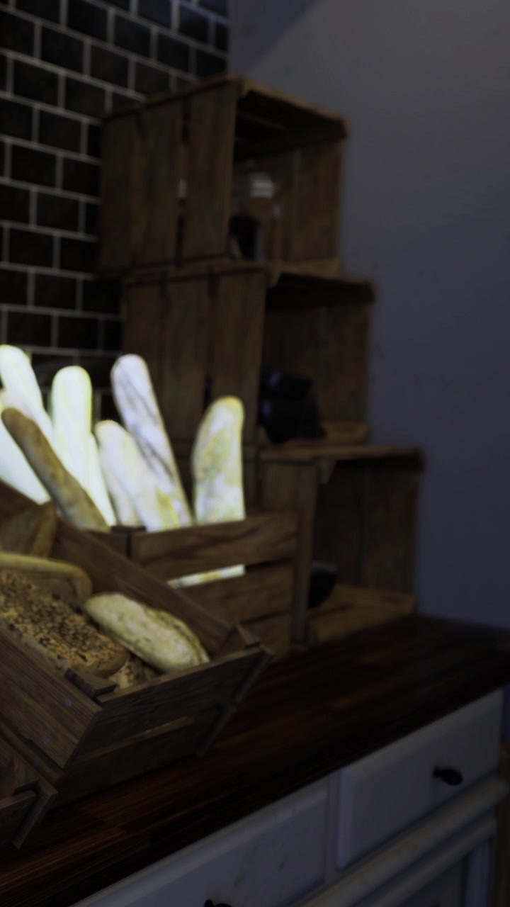 Fresh bread displayed in wooden crates in a rustic kitchen setting