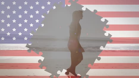 Animation-of-fireworks-and-american-flag-jigsaw-puzzles-revealing-couple-walking-on-beach