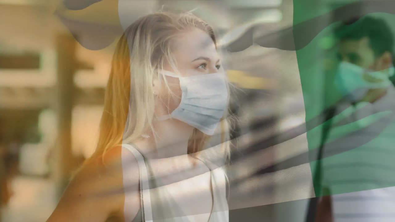 анимация флага кот-д'ивуара, развевающегося над женщиной, носящей маску во время пандемии covid-19