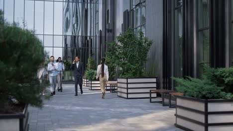 young businesswoman riding electric at office building in morning. city mobility