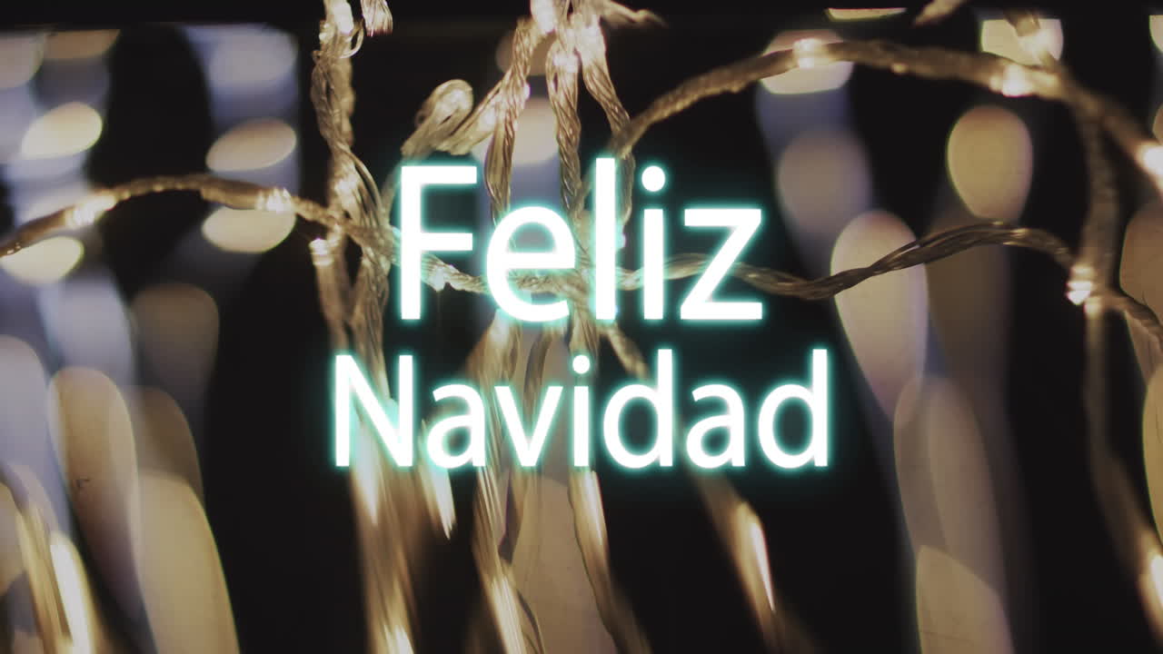 animación del texto de feliz navidad sobre manchas amarillas de fondo claro