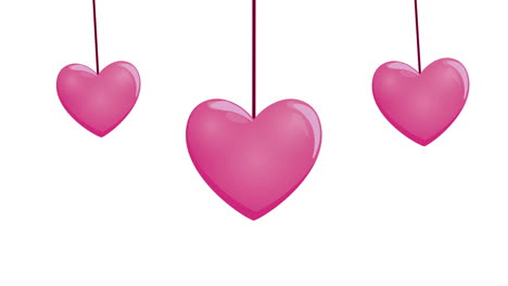 three pink hanging hearts