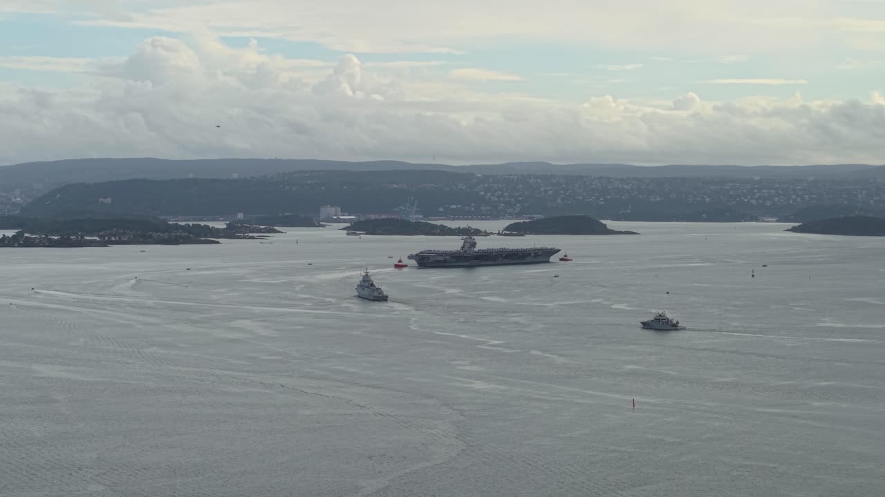 USS Gerald R. Ford Aircraft Carrier Ship For NATO Exercises In Oslo Fjord, Norway. - aerial sot