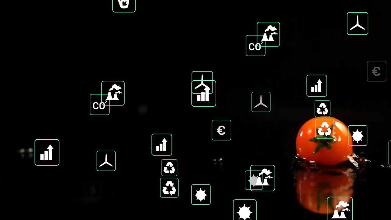 Animating sustainability icons over tomato on reflective black surface