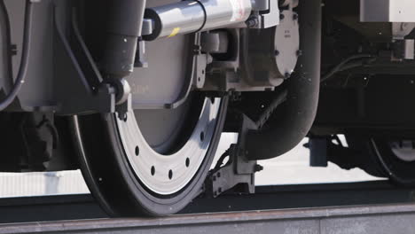 train wheels passing over the railway, closeup view in slowmotion