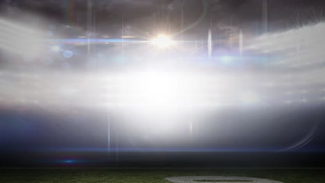 animation of blurred moving lights and bokeh light spots at floodlit sports stadium