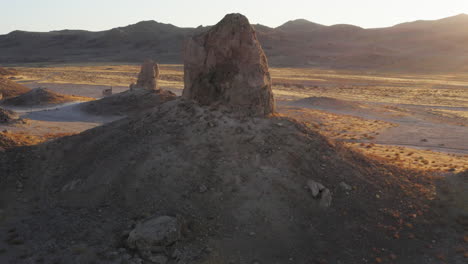 huge pillar at trona pinnacles in blazing sunlight at sunset