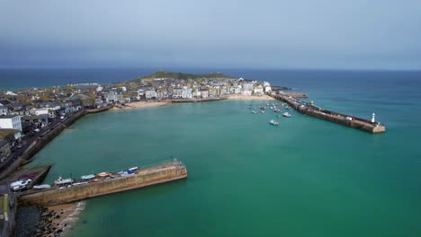 Aerial-View-Over-the-Town-of-St-Ives-Harbor-in-Cornwall-with-Turquoise-Waters-on-a-Summer's-Day-in-England