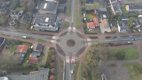 High-angle-view-of-car-stopping-for-cyclist-on-roundabout-in-the-Netherlands