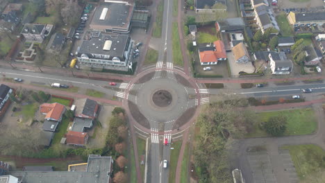 high angle view of car stopping for cyclist on roundabout in the netherlands