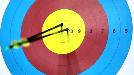 three arrows hits on target. ten. close up archery video