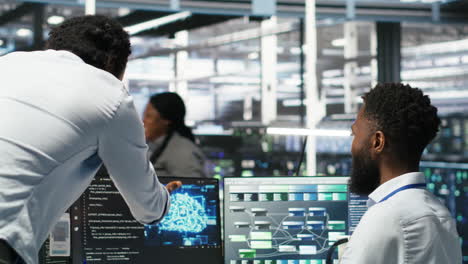 pleased data center manager praising work done by engineer