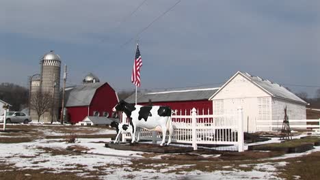 mediumshot of a dairy farm in winter