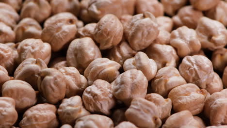 slow motion of falling raw chickpeas. raw food concept.