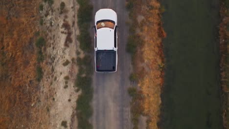 Overhead-Drone-shot-of-a-truck-on-a-dirt