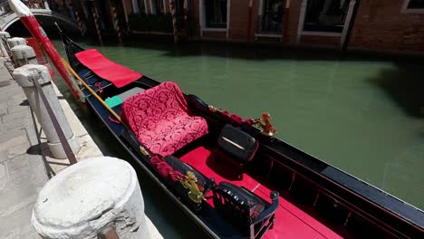 Parking-gondola-boat-closeup-in-Venice,-Veneto,-Italy.