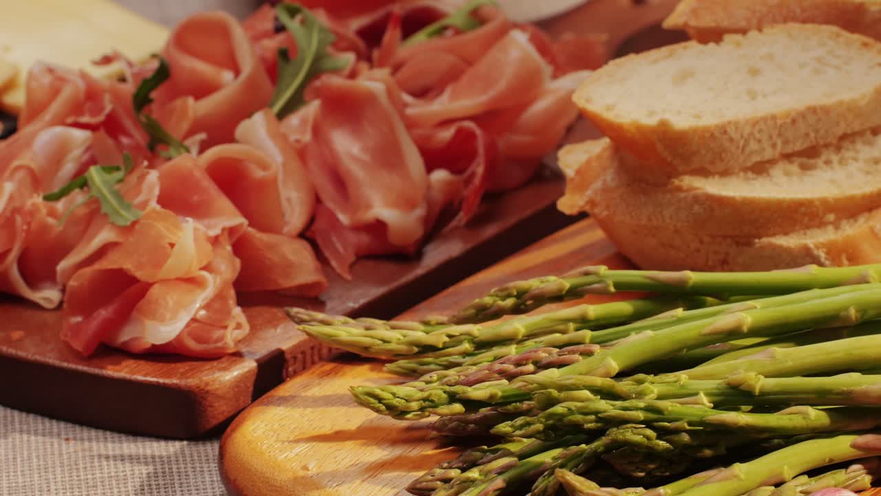 Italian or Spanish restaurant with traditional tapas food, Spanish cuisine, delicious tapas and cheese plate, bruschetta with cheese, olives dry tomatoes and tasty sandwich bar appetizer, buffet