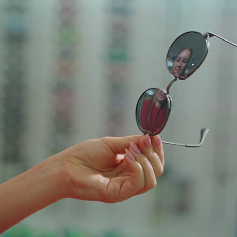 woman at optician with glasses