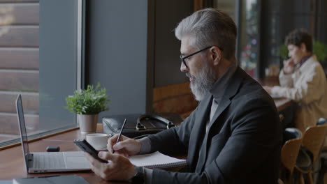 businessman working in a cafe