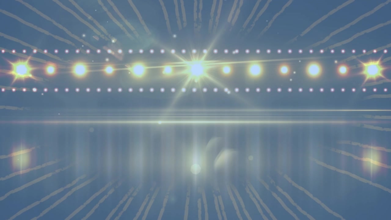 輝くステージライトとレンズフレアのある抽象的な背景