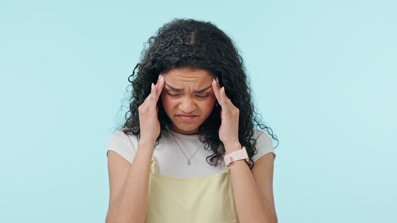 Woman, headache and depression in studio