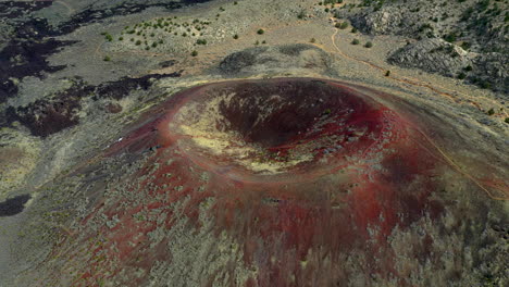 cinder cone volcano, st george, utah, drone shot of one of the red and green cinder cone's in washington county