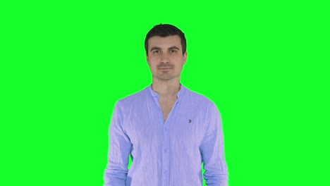 man-saying-no-no,-smiling,-joking-no-hand-gesture,-green-screen-background