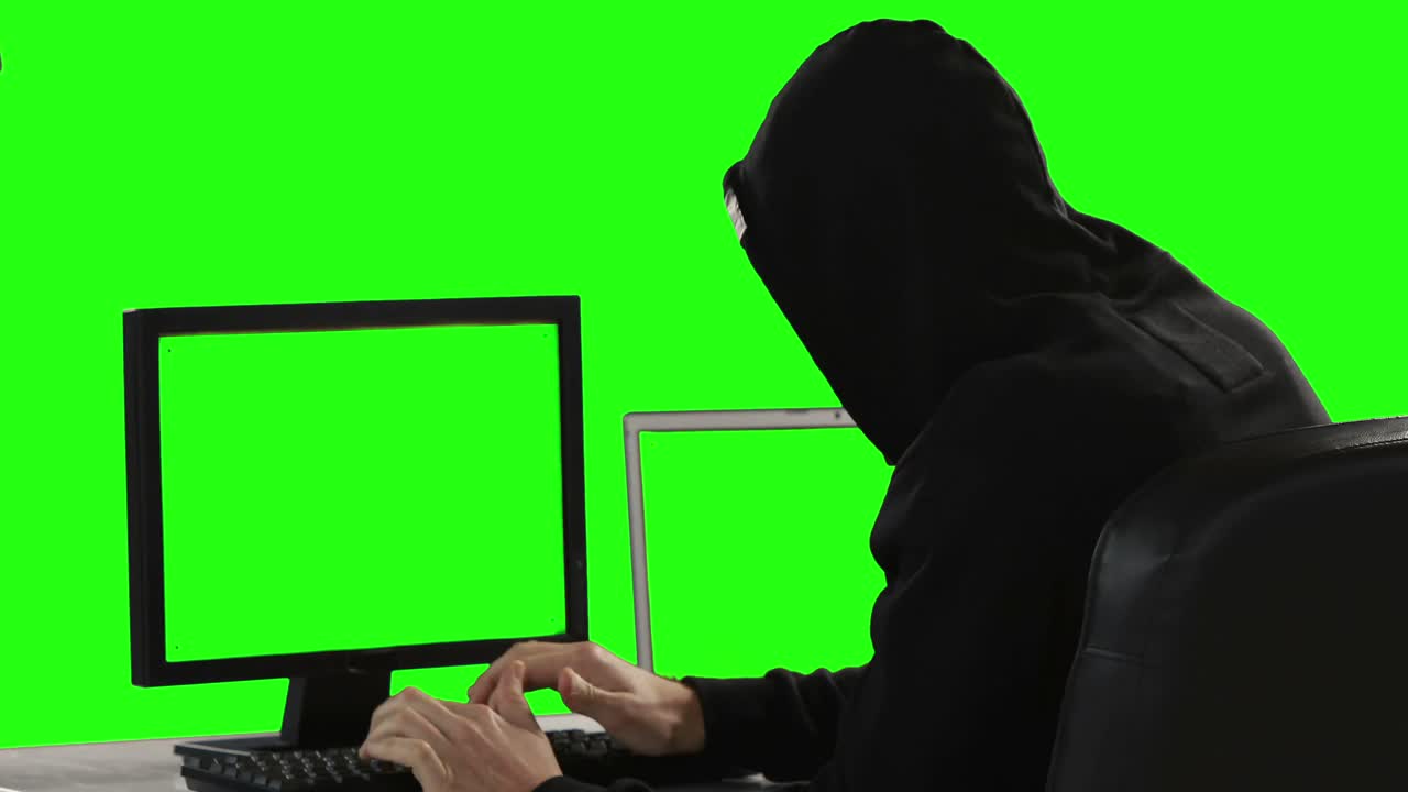 Computer hacker using computers