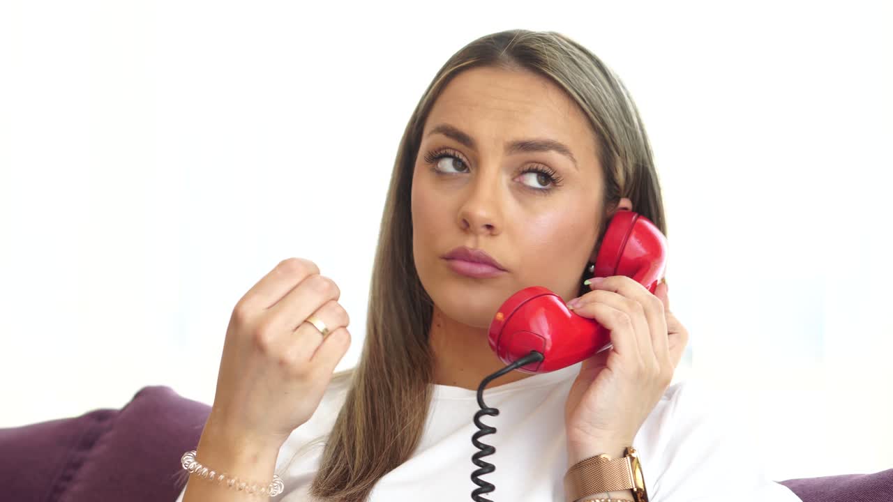 Bored Woman With Old Rotary Landline Phone Waiting on Hold or Listening Somebody Talking Non Stop, Close Up