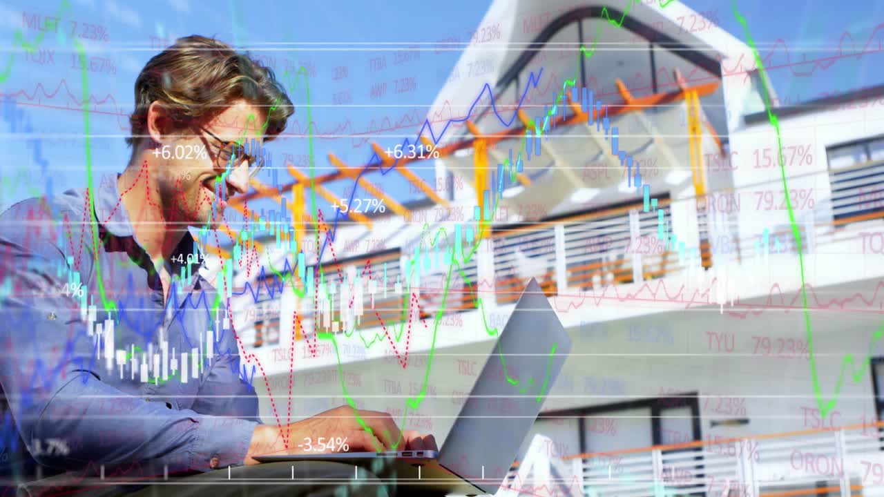 curvas financieras sobre los hombres que usan portátiles.