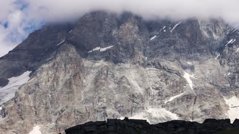 majestic mountain peak with clouds