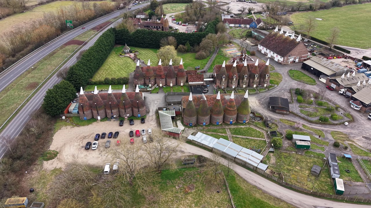 Hop farm in Tonbridge Kent aerial view over rustic English oast houses and rural brewery estate