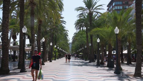 built-in the early 20th century, alicante's popular maritime promenade, the explanada, is iconic for its 6.5 million tricolor marble tiles, creating a wavy mosaic of red, black, and white.