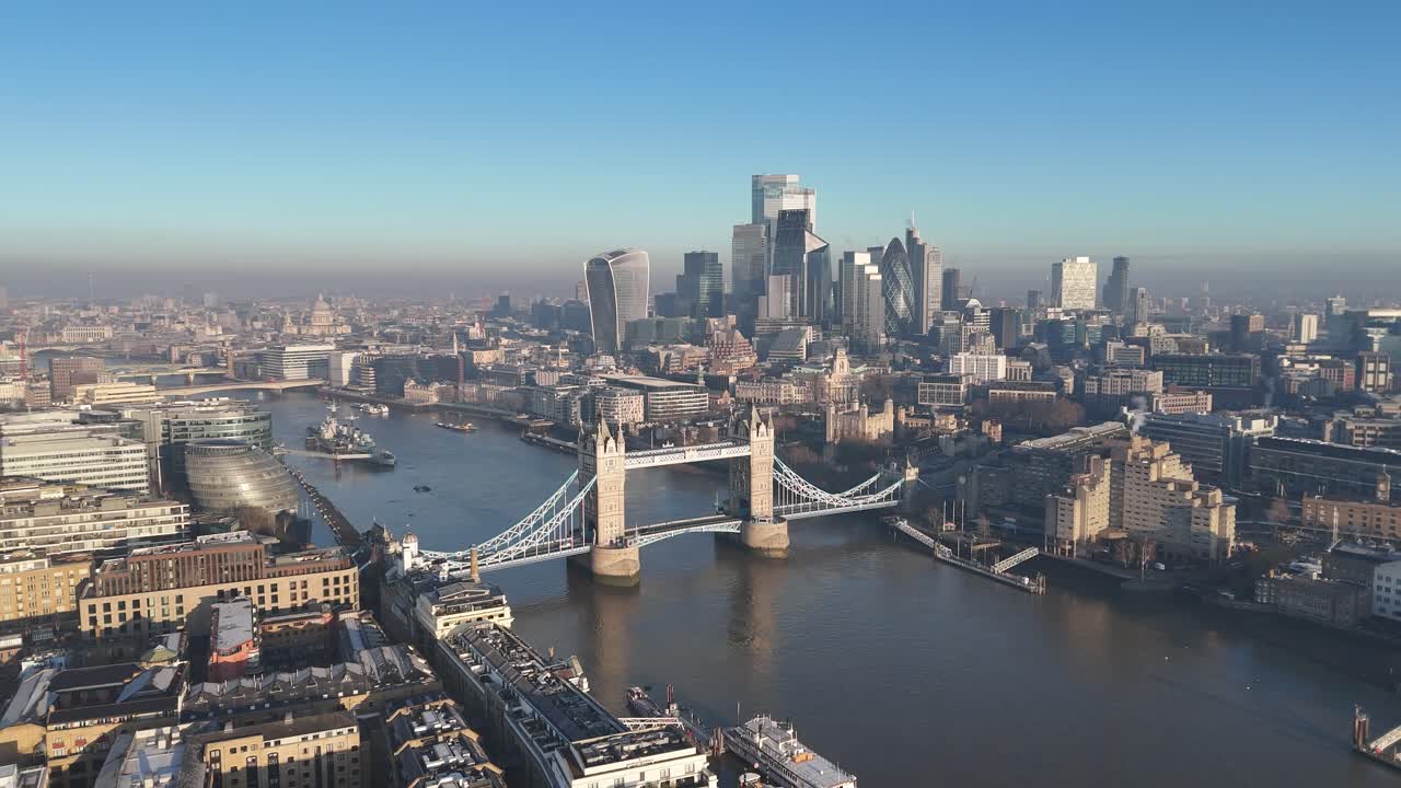 Stunning aerial drone footage of Tower Bridge and London’s modern skyline. A sweeping panoramic view capturing the city’s iconic blend of history and innovation. A unique perspective!.