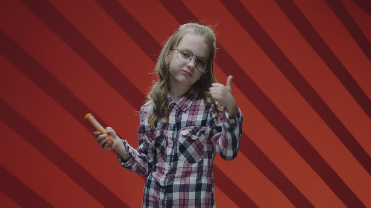Girl eating a carrot