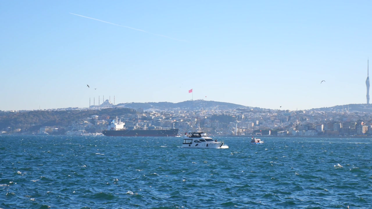 Boats Sailing on Bosphorus Strait with Istanbul Cityscape