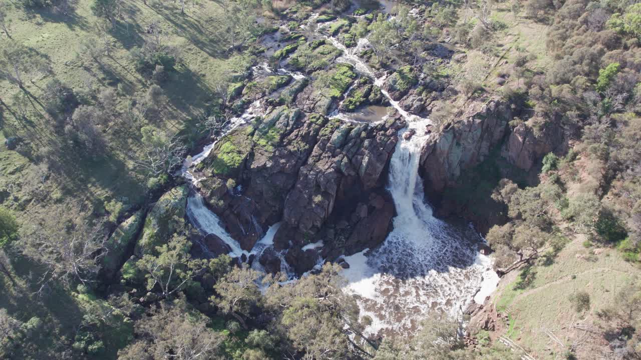 Static aerial view of Nigretta Falls, along the Wannon River, near Hamilton, Victoria, Australia. June 2023.