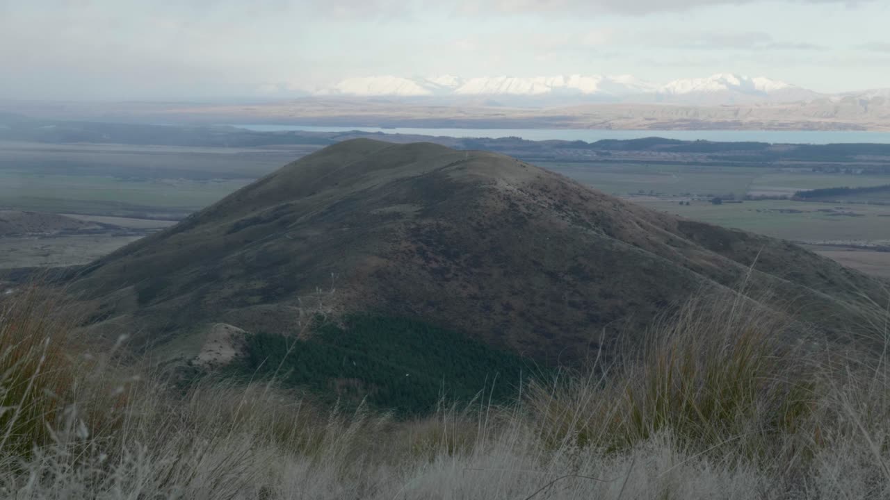 Light snowfall in highlands wilderness of New Zealand's south island