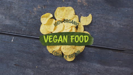 potato chips on wooden surface with 100 percent organic vegan food locally grown animation