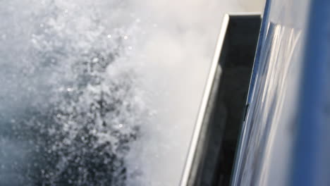 Water-Rushes-by-on-Side-of-Boat