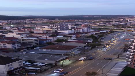 cityscape at dusk/dawn with traffic